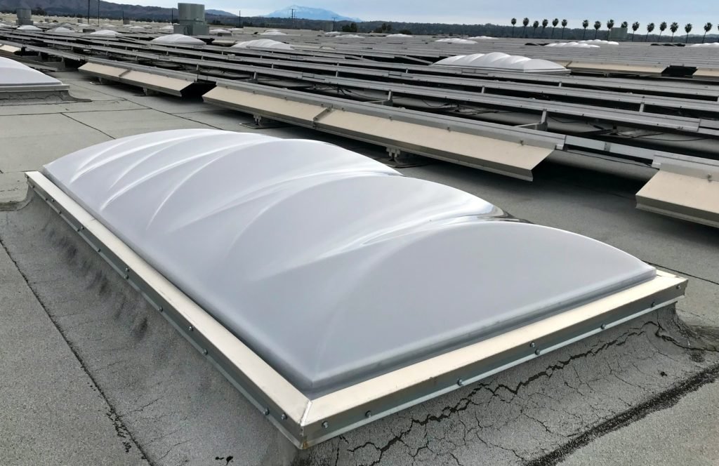 This original capless industrial skylight was converted, as seen now, to a capped system with the Skyco Skylights Conversion Kit.